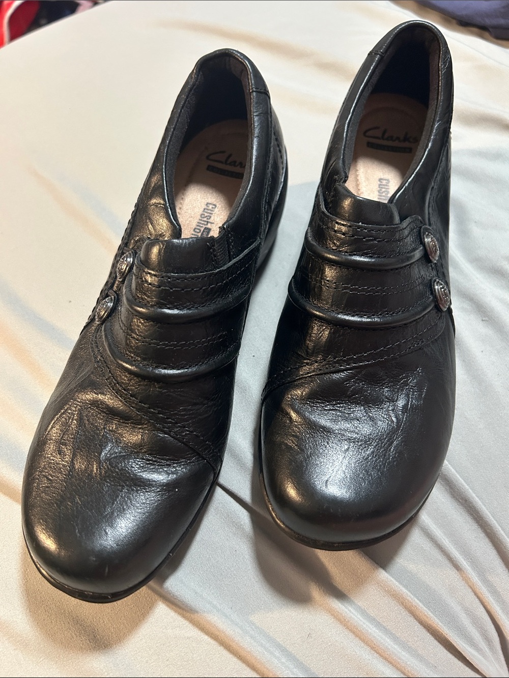Clarks Black Slip-On Leather Loafers with Button Accents